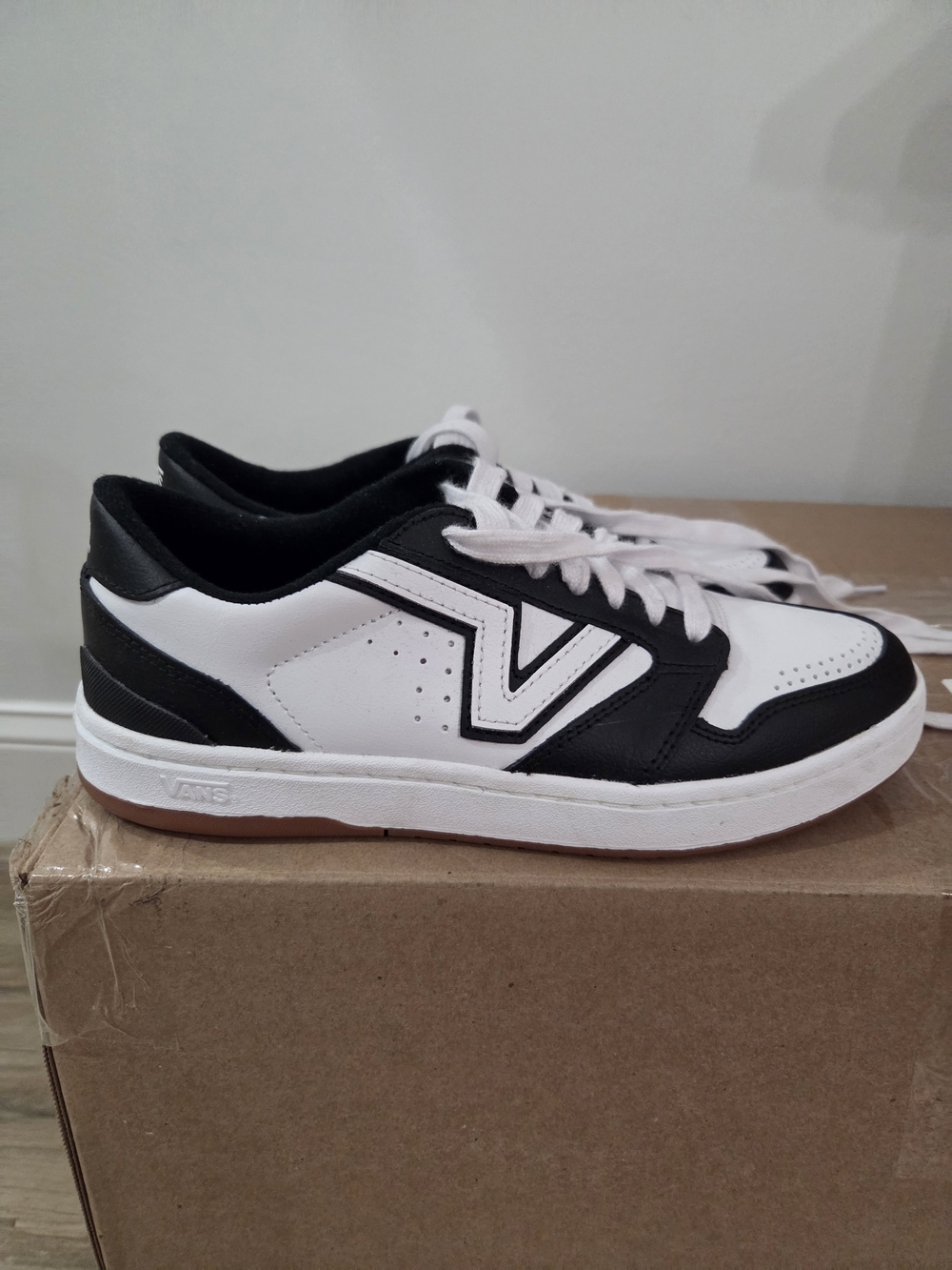 Vans Women's Black and White Low-Top Sneakers with Gum Sole